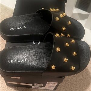 Versace Black Slides with Gold Medusa Accents